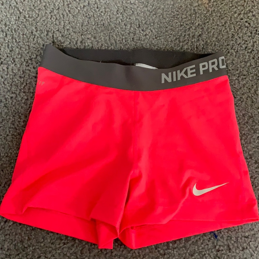 neon pink nike pros